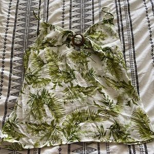 Selling a floral tank top.